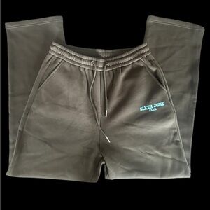 Men's charcoal straight leg sweatpants. With a Tiffany blue hit